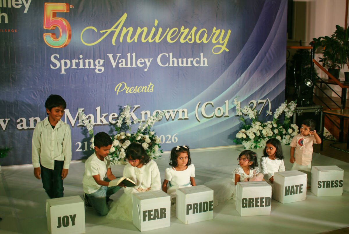 Children performing on stage at the 5th anniversary celebration